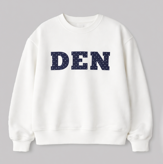 White sweatshirt with 'DEN' printed on it against a gray background