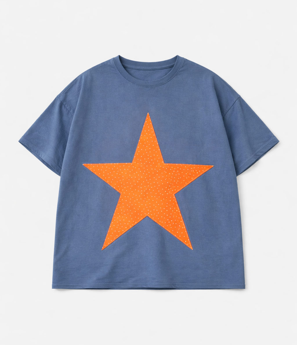 Blue t-shirt with an orange star on a light blue background
